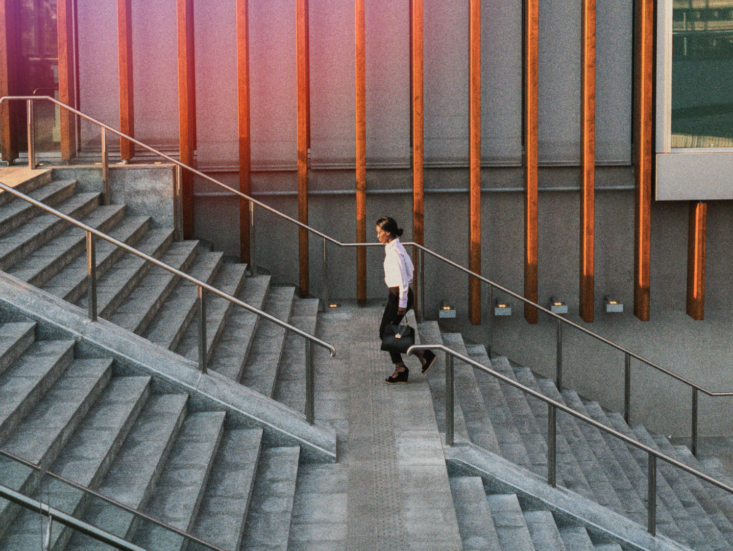 Professional walking through a modern workplace